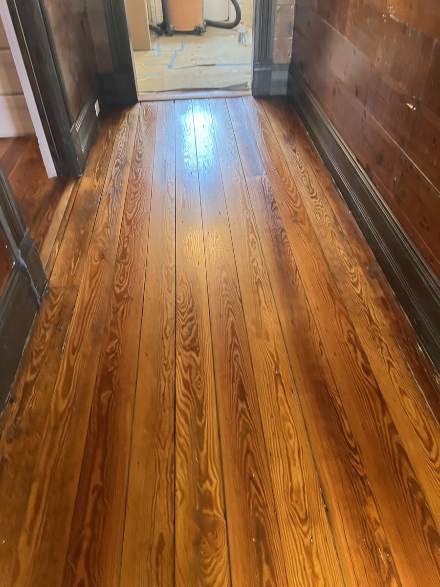 The same heart pine floor after staining and sealing