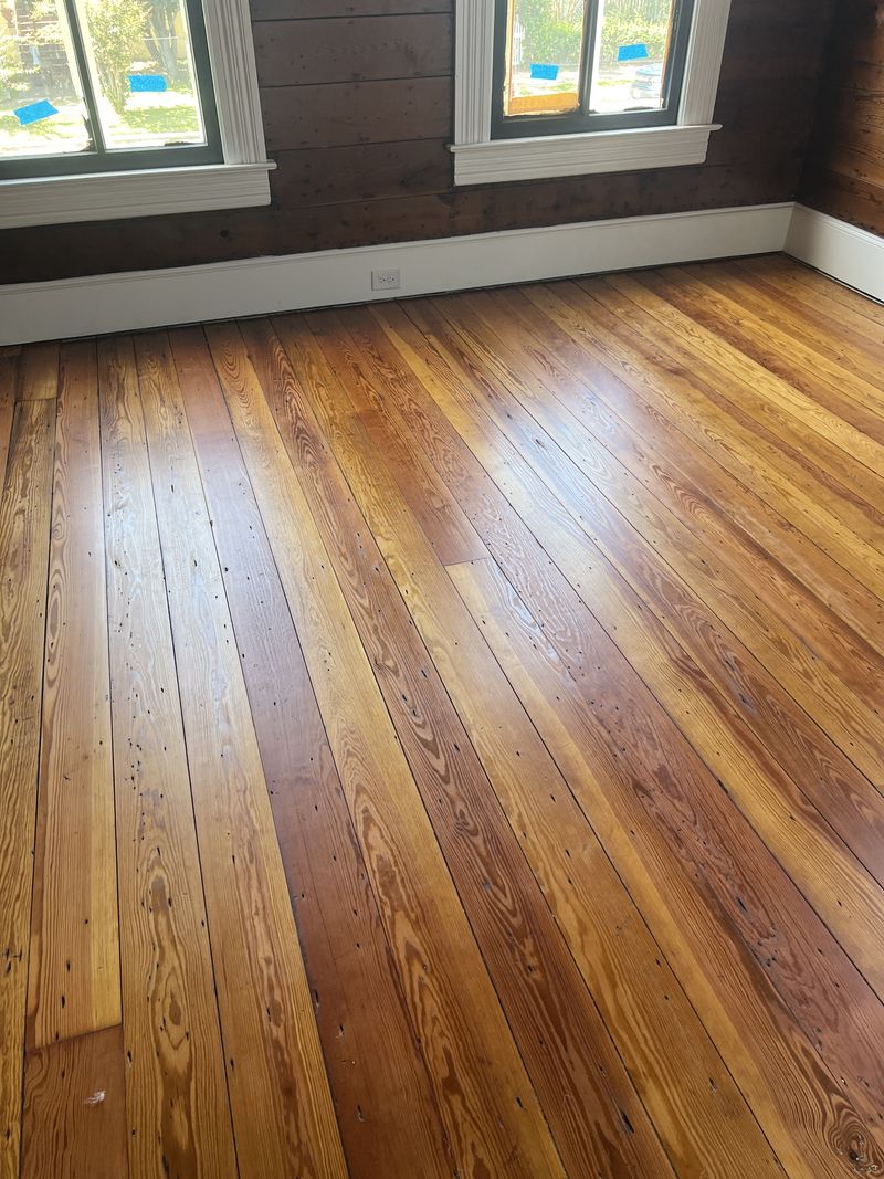 Repaired and refinished heart pine floor